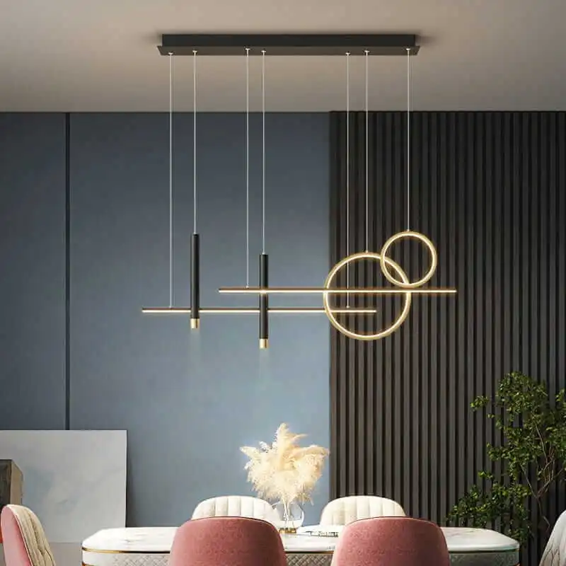 Lampa-wiszaca-regulowana-barwa-oswietlenie-stolu-w-salonie-Axis-czarno-zlota.webp