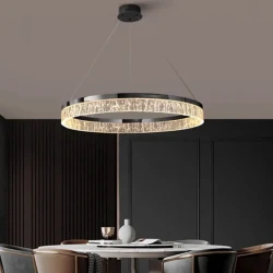 Designerska-lampa-glamour-Aurevia-Black-60-nad-stolik-w-salonie.webp