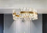 Żyrandol-ryształowy-LED-do-salonu-Cesar-orągły-60cm-mosiądz-szczotkowany.webp