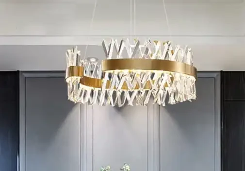 Żyrandol-ryształowy-LED-do-salonu-Cesar-orągły-60cm-mosiądz-szczotkowany.webp